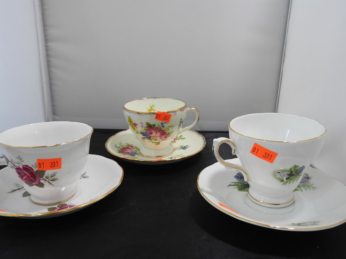 Set of 3 Vintage Bone China Teacup and Saucers: Set of three vintage bone china teacups and saucers with matching patterns; see photos for individual designs. Measured as packed. Approx. 10 x 6 x 6 in.