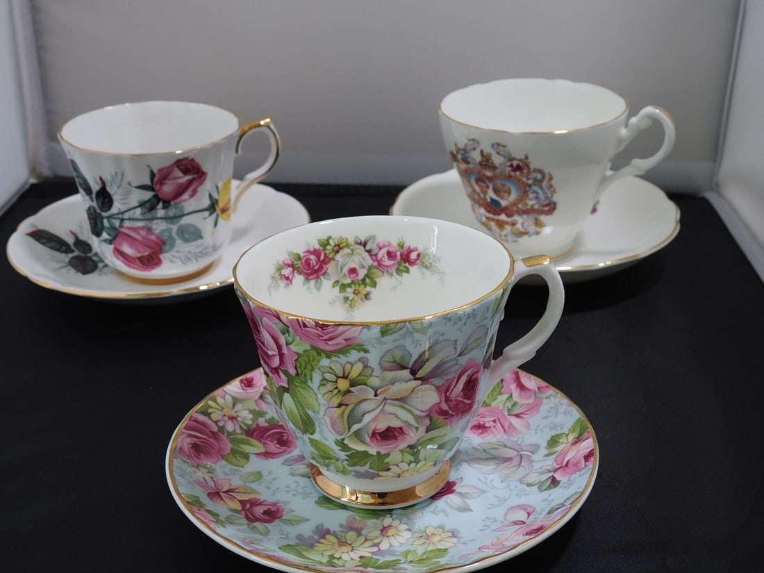 Set of 3 Vintage Bone China Teacup and Saucers: Set of three vintage bone china teacups and saucers with matching patterns; see photos for individual designs. Measured as packed. Approx. 10 x 6 x 6 in.