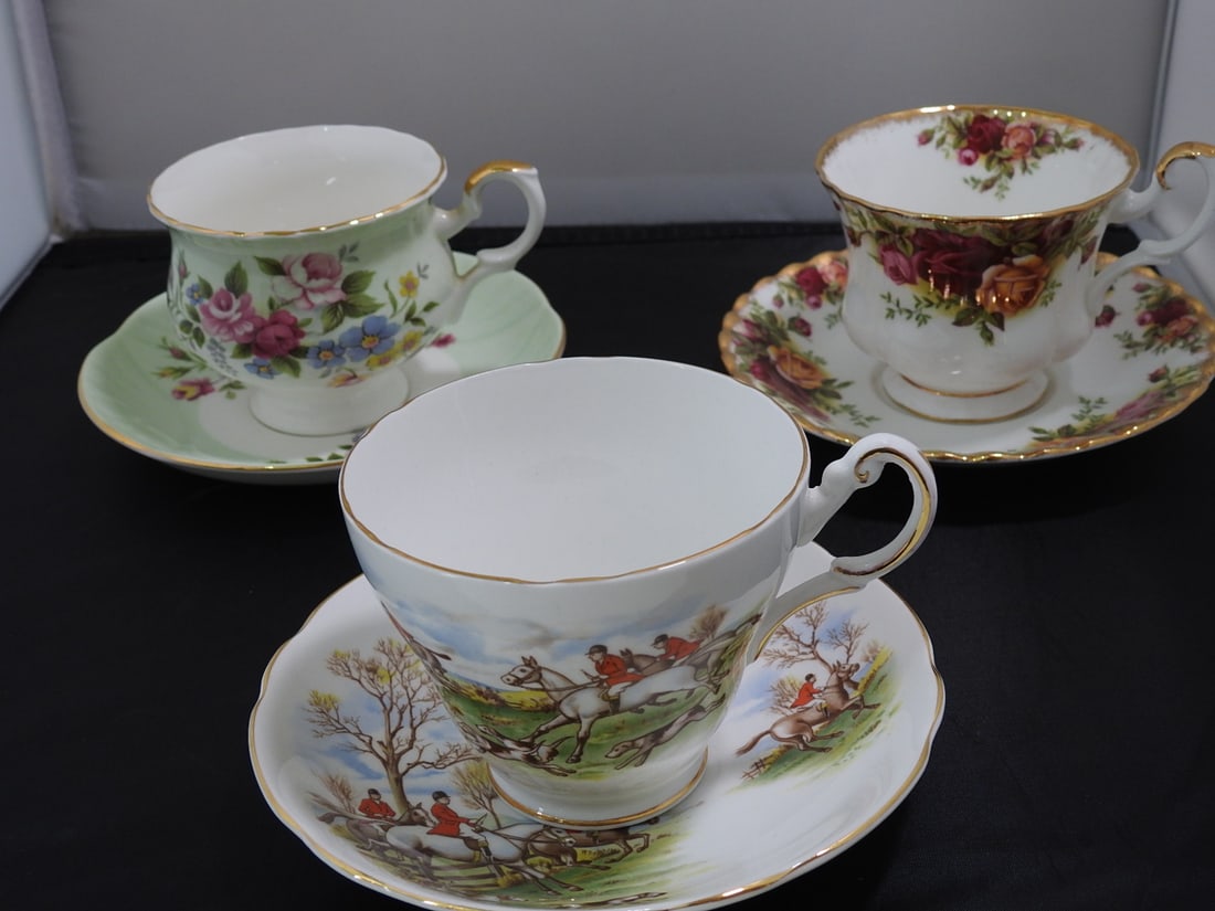 Set of 3 Vintage Bone China Teacup and Saucers: Set of three vintage bone china teacups and saucers with matching patterns; see photos for individual designs. Measured as packed. Approx. 10 x 6 x 6 in.