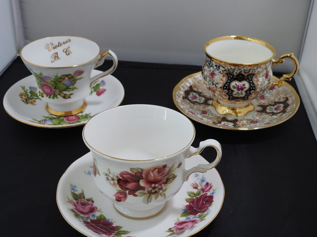 Set of 3 Vintage Bone China Teacup and Saucers: Set of three vintage bone china teacups and saucers with matching patterns; see photos for individual designs. Measured as packed. Approx. 10 x 6 x 6 in.