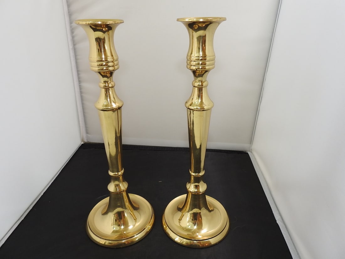 Pair of Large Brass Candlesticks: Pair of Large Brass Candlesticks. detachable head for easy polishing Approx. 12 x 4.5 x 9 in.