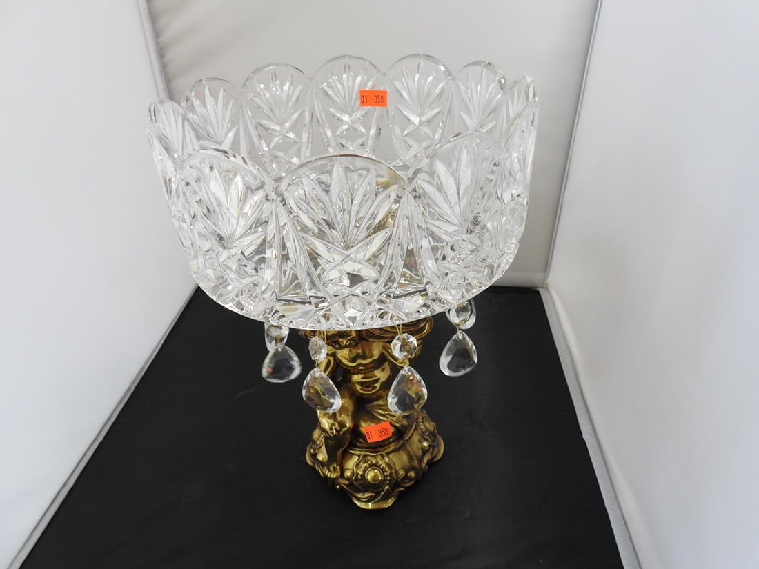 Large Crystal and Brass Pedestal Centerpiece: Large Crystal and Brass Pedestal Centerpiece. With Cupid Made in Germany 24% Lead Crystal Approx. 11.5 x 8.5 x 8.5 in.
