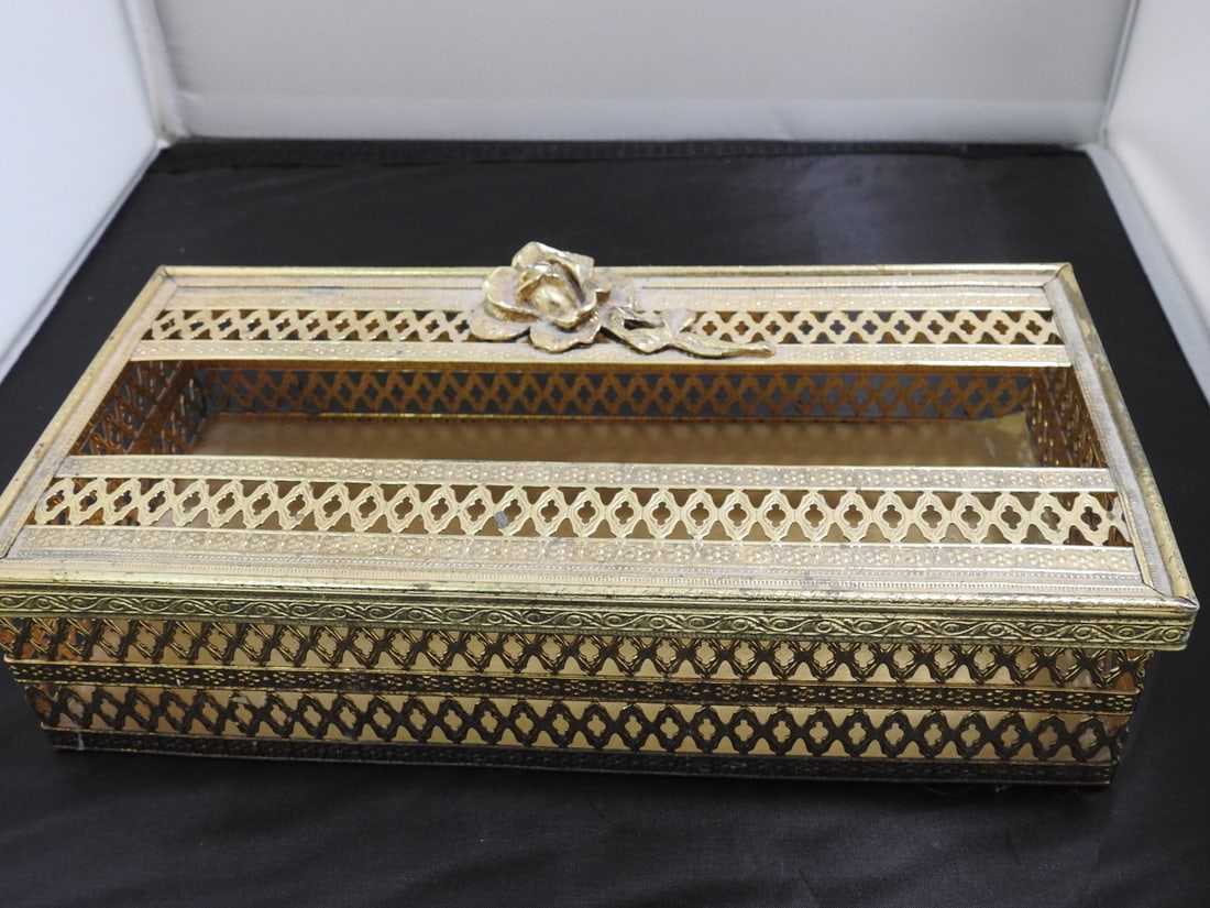 Vintage Brass Filigree Tissue Holder: Vintage Brass Filigree Tissue Holder. with stem rose on top and felted bottom Approx. 2.5 x 10.5 x 5.5 in.