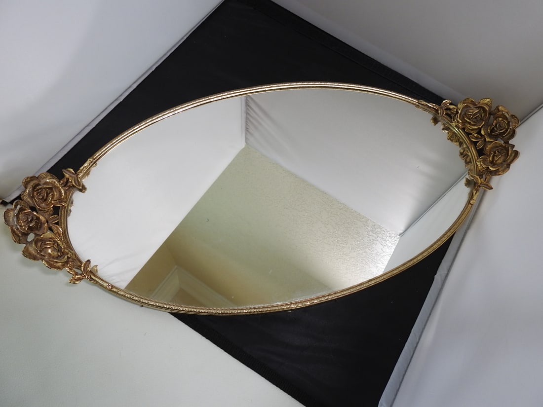 oval Vanity Mirror Tray: oval Vanity Mirror Tray. 2 applied handles of roses, and a felted bottom Approx. 2.5 x 20.5 x 11 in.
