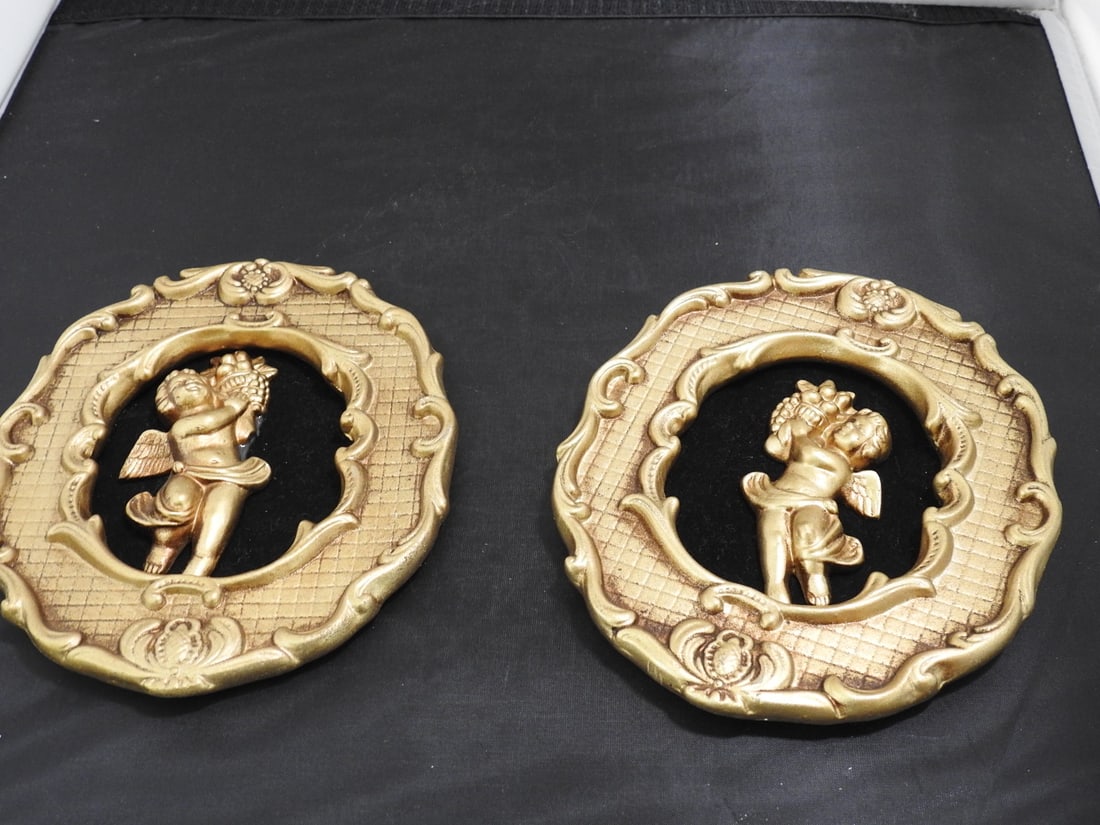 Ceramic Cupid wall plaques: Ceramic Cupid wall plaques.