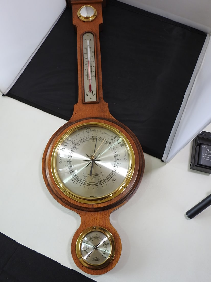 Vintage Wall Thermometer: Vintage Wall Thermometer. By Howard Miller, Model - 612-715, wood base with brass fiztures Approx. 30 x 9 x 3.5 in.