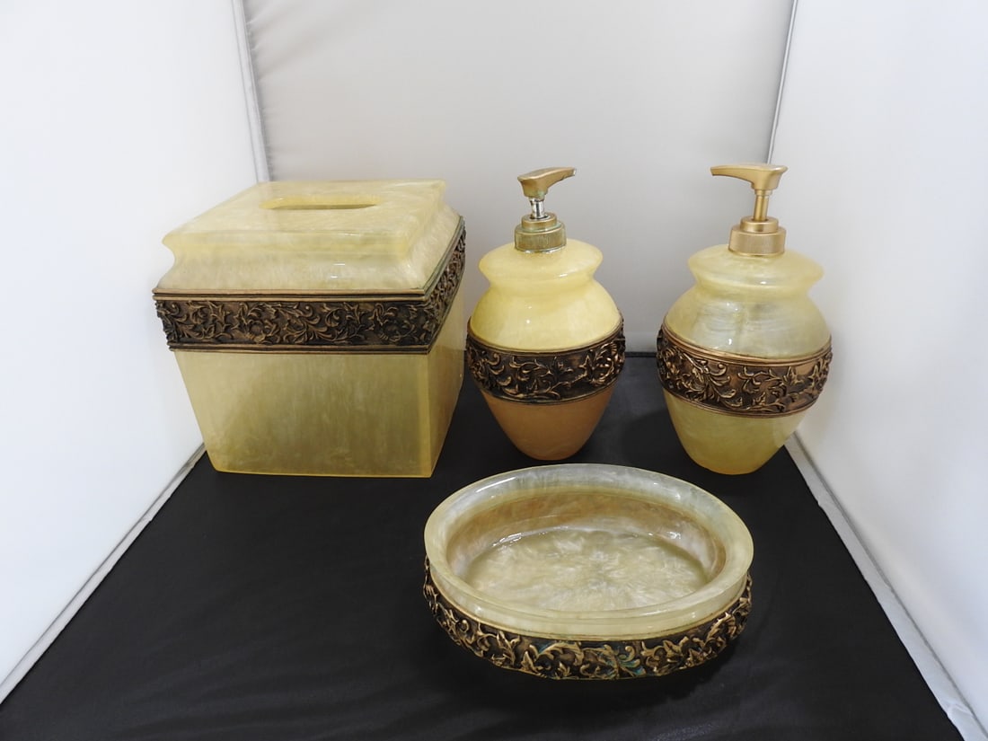 Classic European Style Bathroom set: Classic European Style Bathroom set. Faux alabaster and bronze Made of resinIncluded in set Soap dish, Liquid soap bottle, lotion bottle, tissue holder Approx. 10 x 7.5 x 7.5 in.
