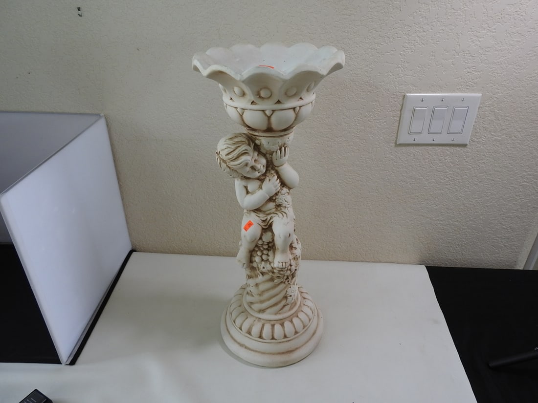 Cherub Pedestal Small Flower Pot: Cherub Pedestal Small Flower Pot. Faux Stone, Hollow Ceramic Approx. 24 x 9.5 x 9.5 in.