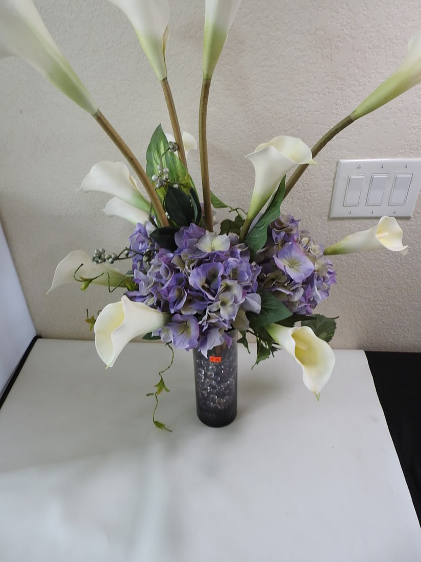Classic silk flower arrangement: Classic silk flower arrangement. Amethys colored vase Approx. 31 x 15 x 15 in.