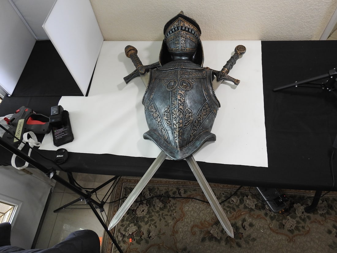 Antique Suit of Arms: Antique Suit of Arms. Appears to be Asian, Swords can be detached, Faux Iron, Made of hard Resin, Blades are stainless steel Approx. 39 x 24 x 10 in.