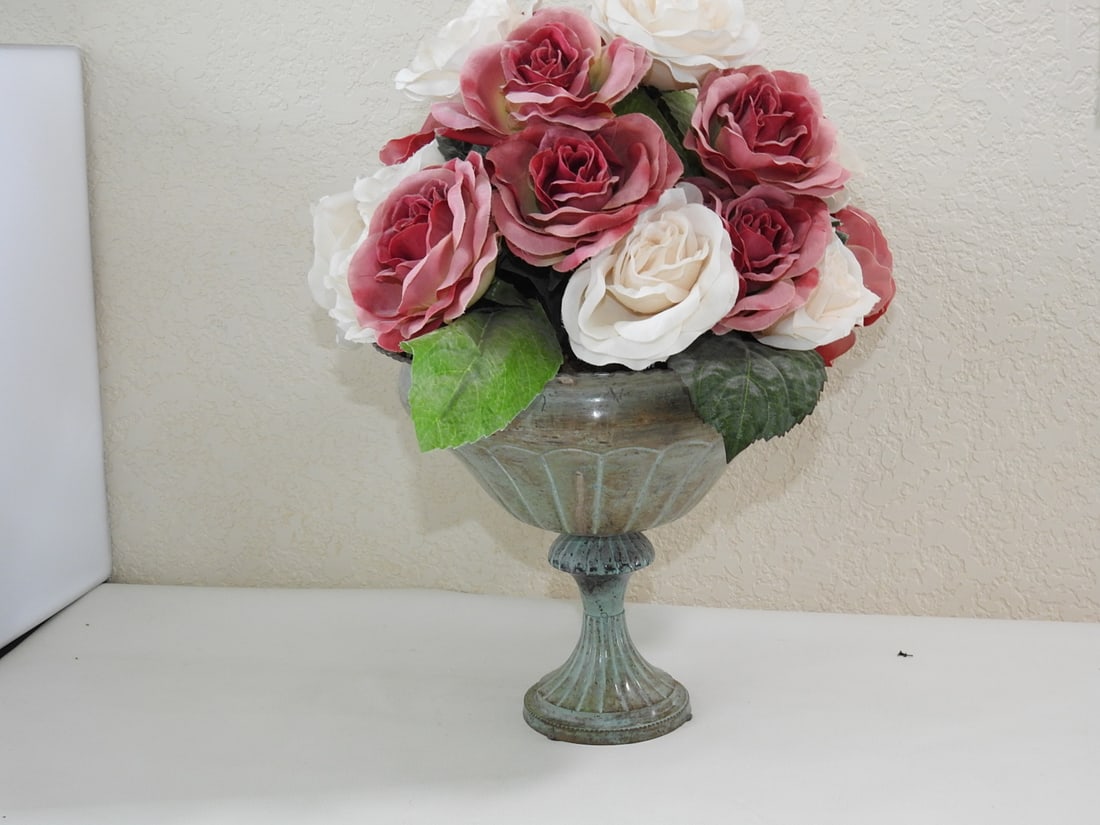 Classic European Style Silk Flower Arrangement: Classic European Style Silk Flower Arrangement. Flowers, Base is faux stone painted metal Approx. 18 x 13 x 13 in.