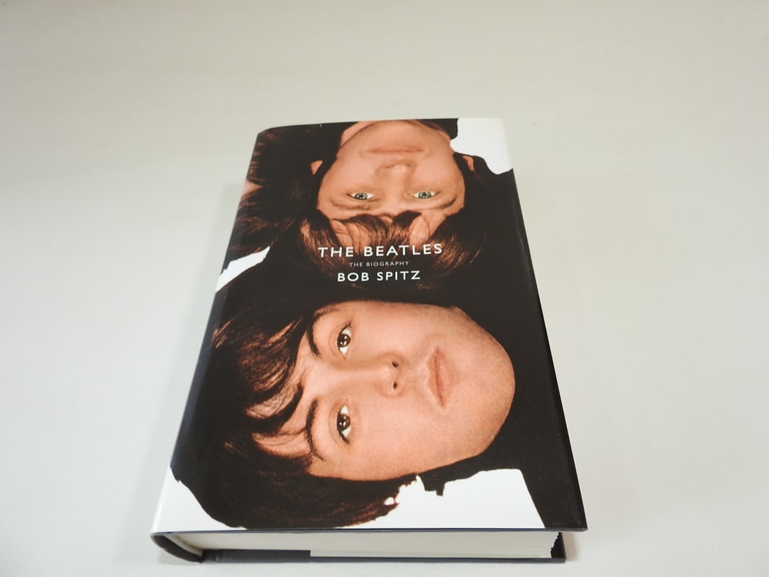 The Beatles: The Biography by Bob Spitz: Decorative or collectible hardcover volume. Approx. 9.5 x 6.5 x 2 in.