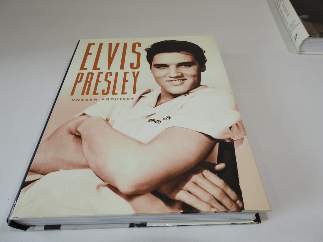 Elvis Presley: Unseen Archive by Marie Clayton: Decorative or collectible hardcover volume. Approx. 11 x 9 x 1.5 in.