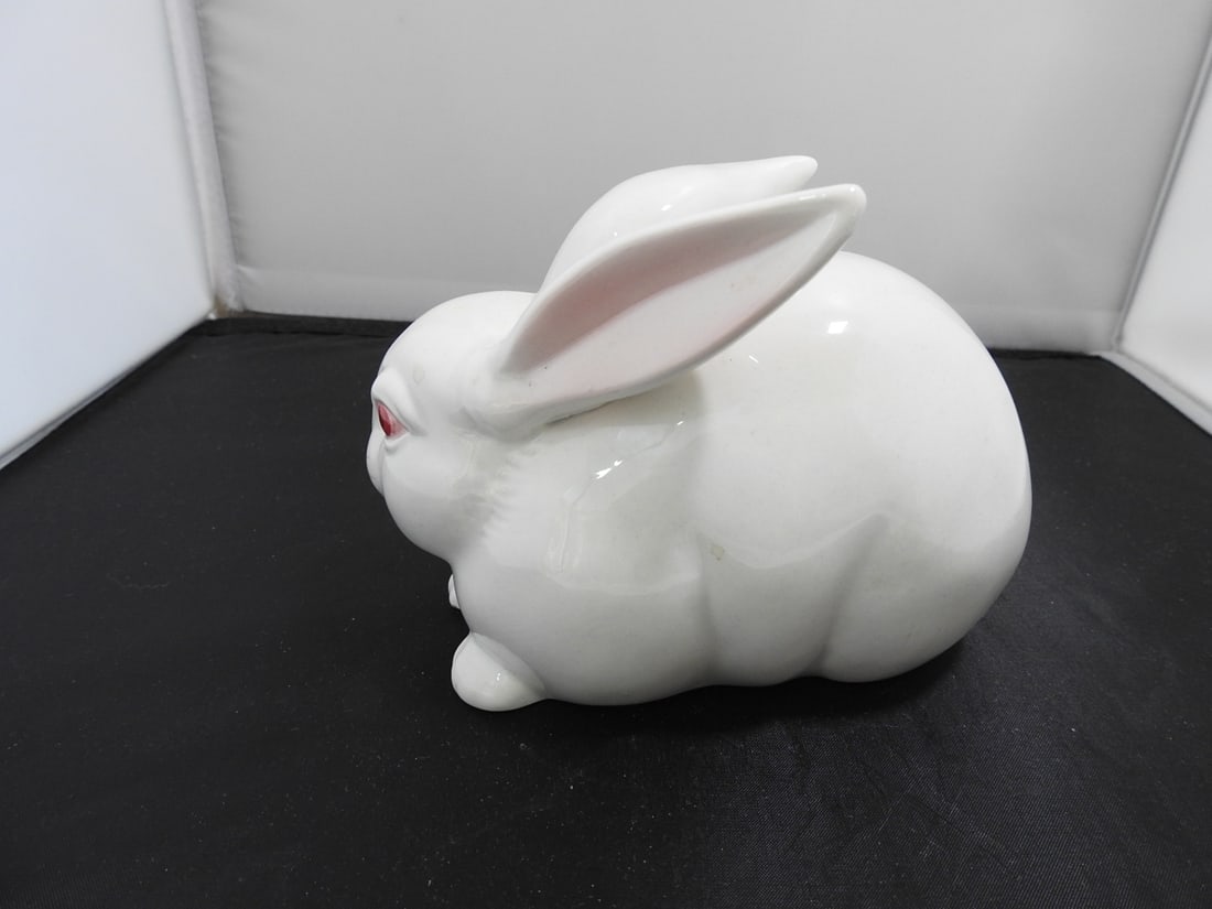 Fitz and Floyd Ceramic Rabbit Figurine: Vintage Fitz and Floyd ceramic rabbit figurine in glossy white finish with pink ear detail. Marked Fitz and Floyd, made in Japan. Approx. 4.5 x 6.5 x 4.5 in.
