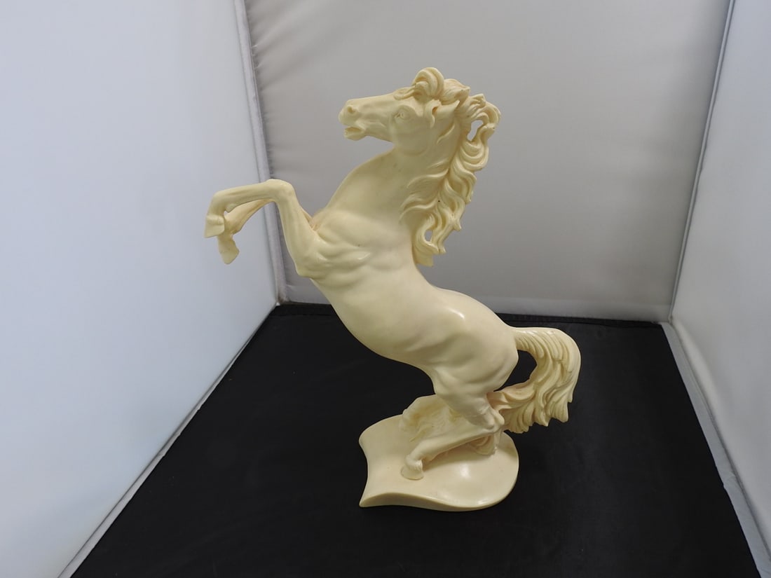 A. Santini Italian Rearing Stallion Sculpture: Vintage Italian rearing horse/stallion sculpture signed A. Santini, made of heavy resin with faux white marble finish. Approx. 11 x 9.5 x 4 in.