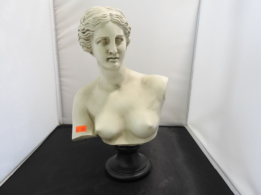 Venus de Milo Classical Resin Bust: Classical Venus de Milo style bust in hard resin with white marble-look finish on black base. Approx. 12 x 8 x 4.75 in.