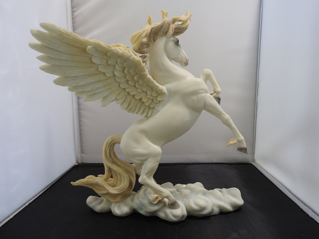 Veronese Design Pegasus Resin Statue: Veronese Design Pegasus statue in hard painted resin with white and gold-tone finish. Approx. 11 x 10.75 x 6.75 in.
