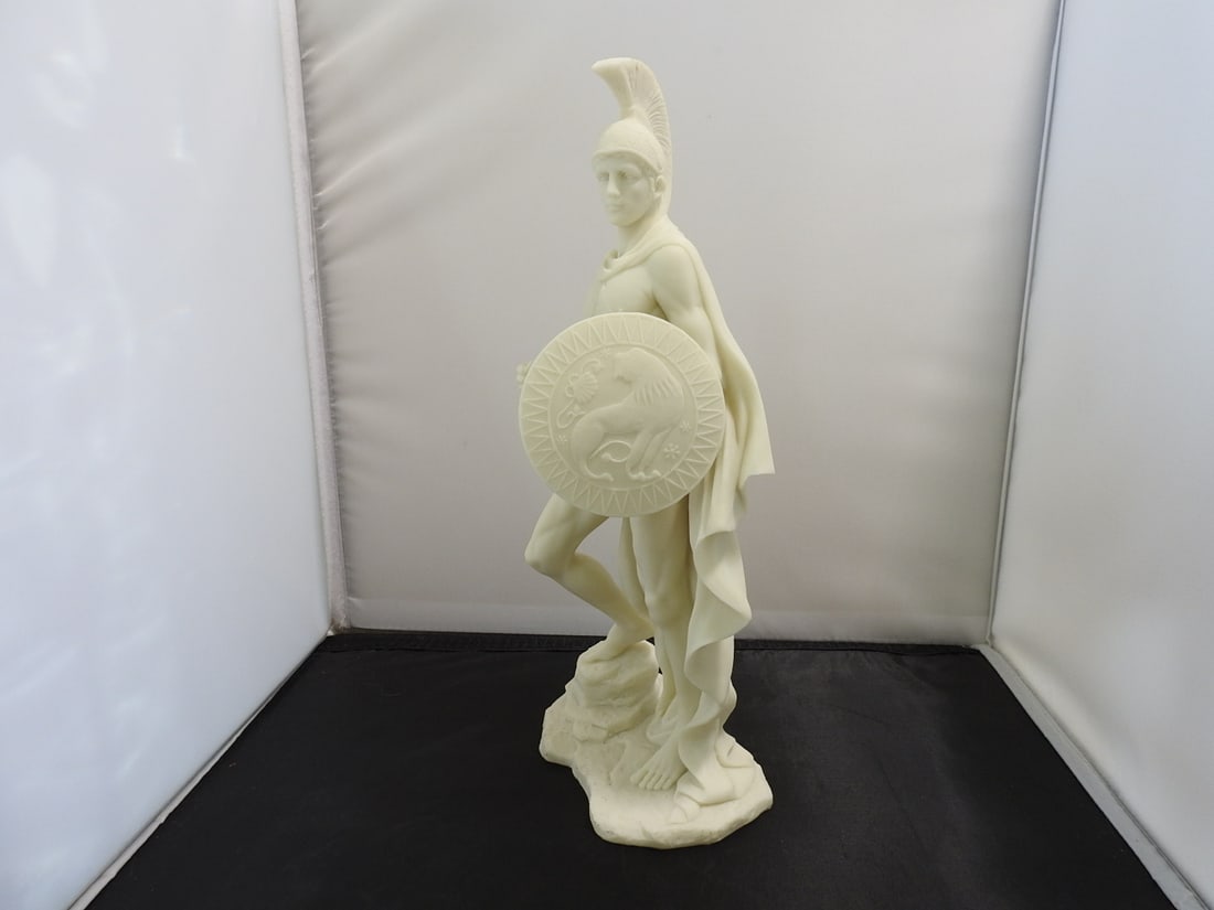 Ares Classical Resin Statue: Top Land Trading Myths and Legends line classical statue depicting Ares with shield and helmet. Approx. 12.5 x 6 x 4.5 in.