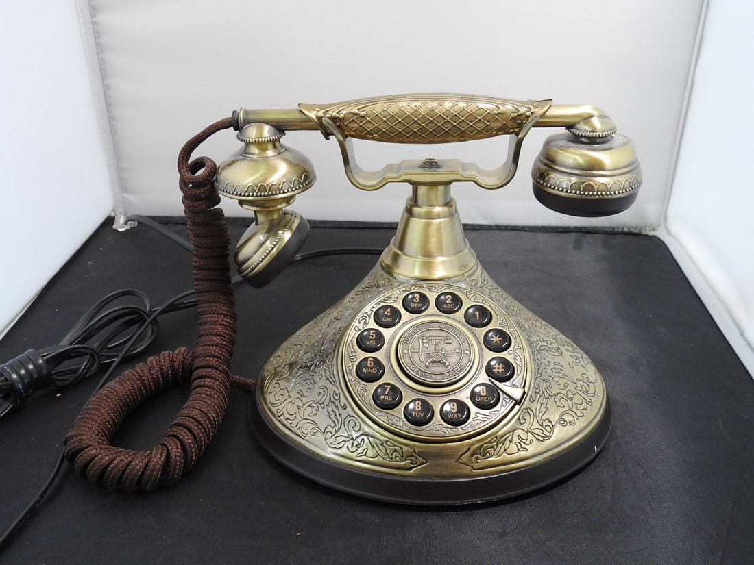 Paramount Collection Classic Series 1935 Style Decorative Telephone: Vintage rotary-style decorative telephone replica by The Paramount Collection, Classic Series model 1935, serial no. A004041020. Features an antiqued brass-tone cast metal body, filigree-style