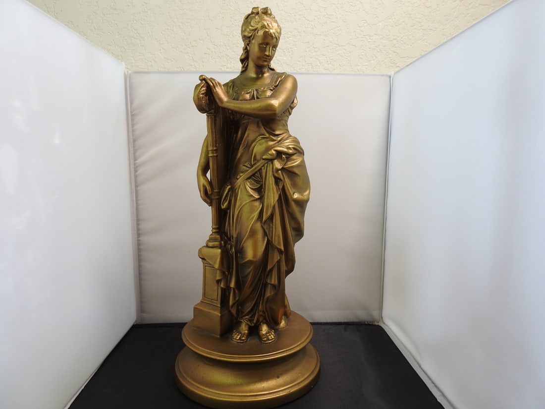 Esco Products Music and Poetry Faux Bronze Statue: Music and Poetry faux bronze statue by Esco Products, mounted on a round base with classical figural design. Approx. 18 x 8 x 8 in.