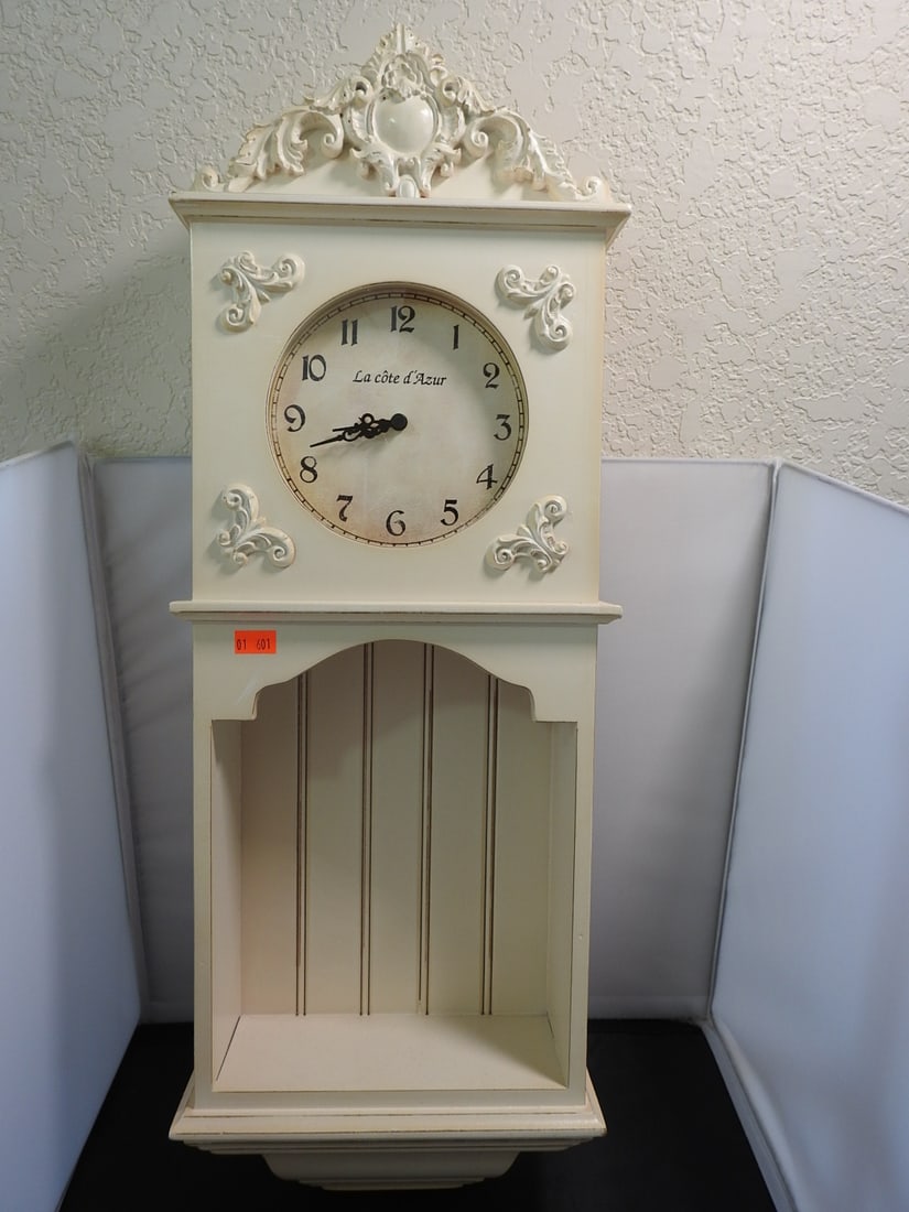 Shabby Chic French Style Wall Clock with Cubby Shelf: Shabby chic French style wall clock with light painted finish and small cubby / shelf storage section at the bottom. Approx. 25 x 9.25 x 4.5 in.