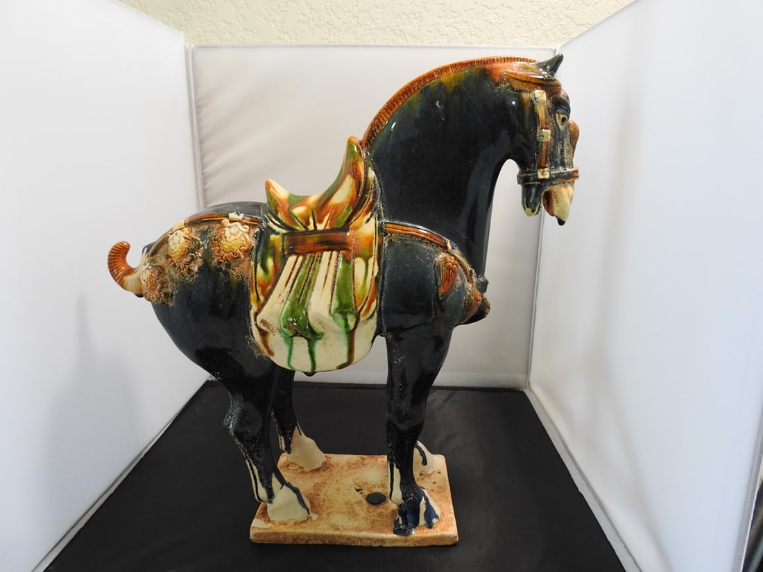 Hand-Painted Majolica Tang Dynasty Style Horse Figure: Tang Dynasty style horse figure in hand-painted ceramic / majolica with ash blue body and colorful saddle decoration. Approx. 14.25 x 14.5 x 6 in.