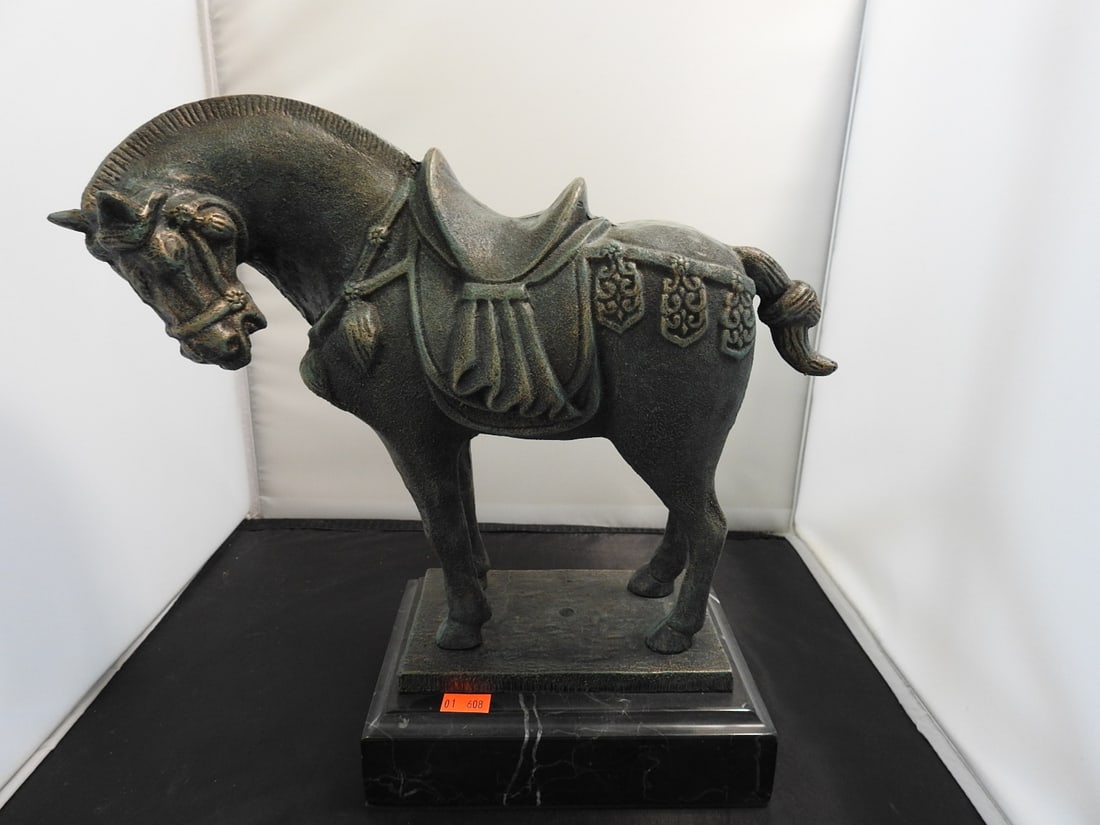 Faux Bronze Cast Metal Tang Dynasty Style Horse Statue: Tang Dynasty style horse statue in cast metal with faux bronze finish, mounted on a rectangular base. Approx. 11.5 x 11.5 x 5.5 in.