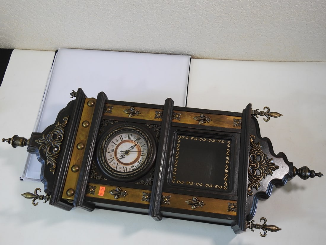 Old World French Style Wall Clock: Old World French style wall clock with real wood case, cast metal/brass decorative elements, and ornate architectural form. Approx. 33 x 12.75 x 5.5 in.