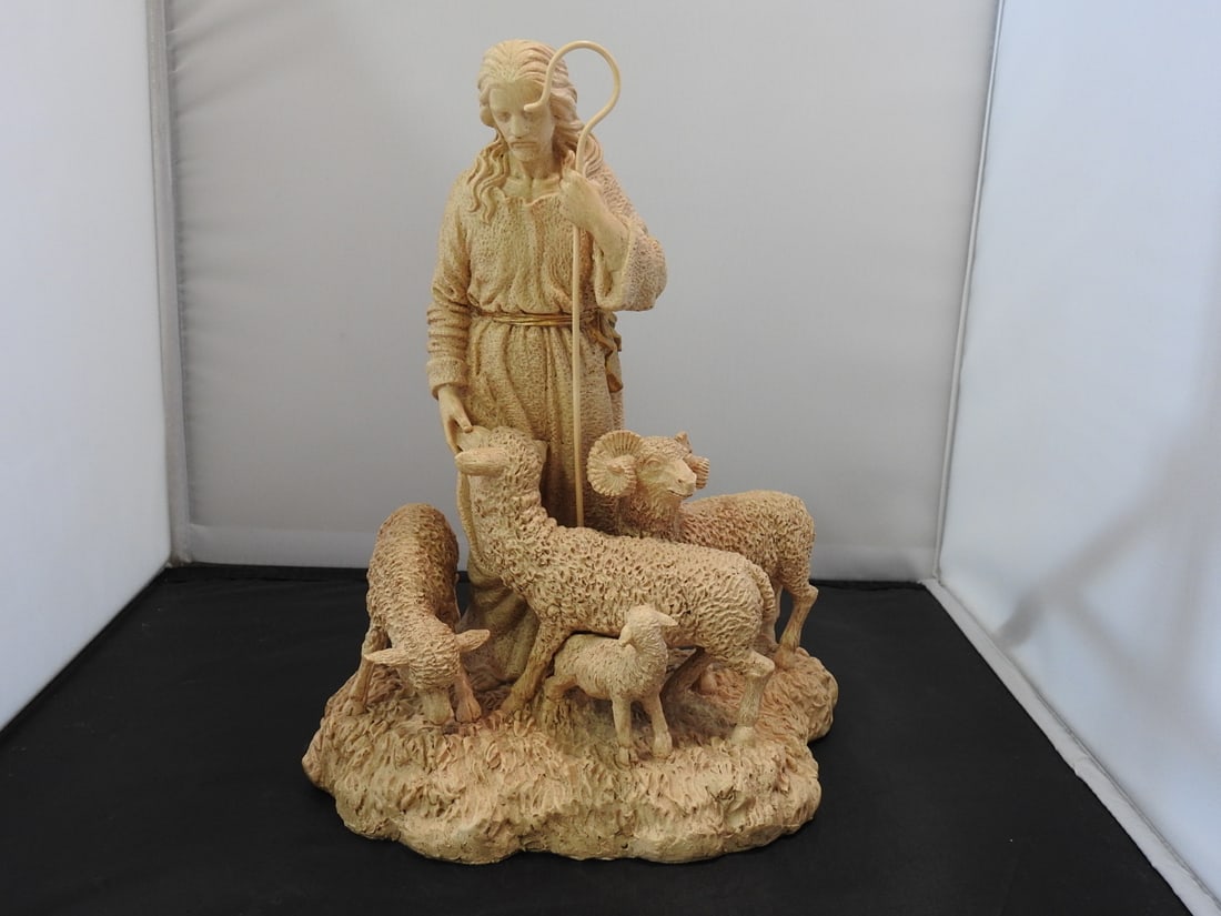 Jesus Shepherding Lambs Faux Marble Resin Statue: Jesus shepherding lambs statue in hand-painted resin with faux marble finish. Paint chipping visible as shown. Approx. 10.5 x 8.5 x 6.25 in.