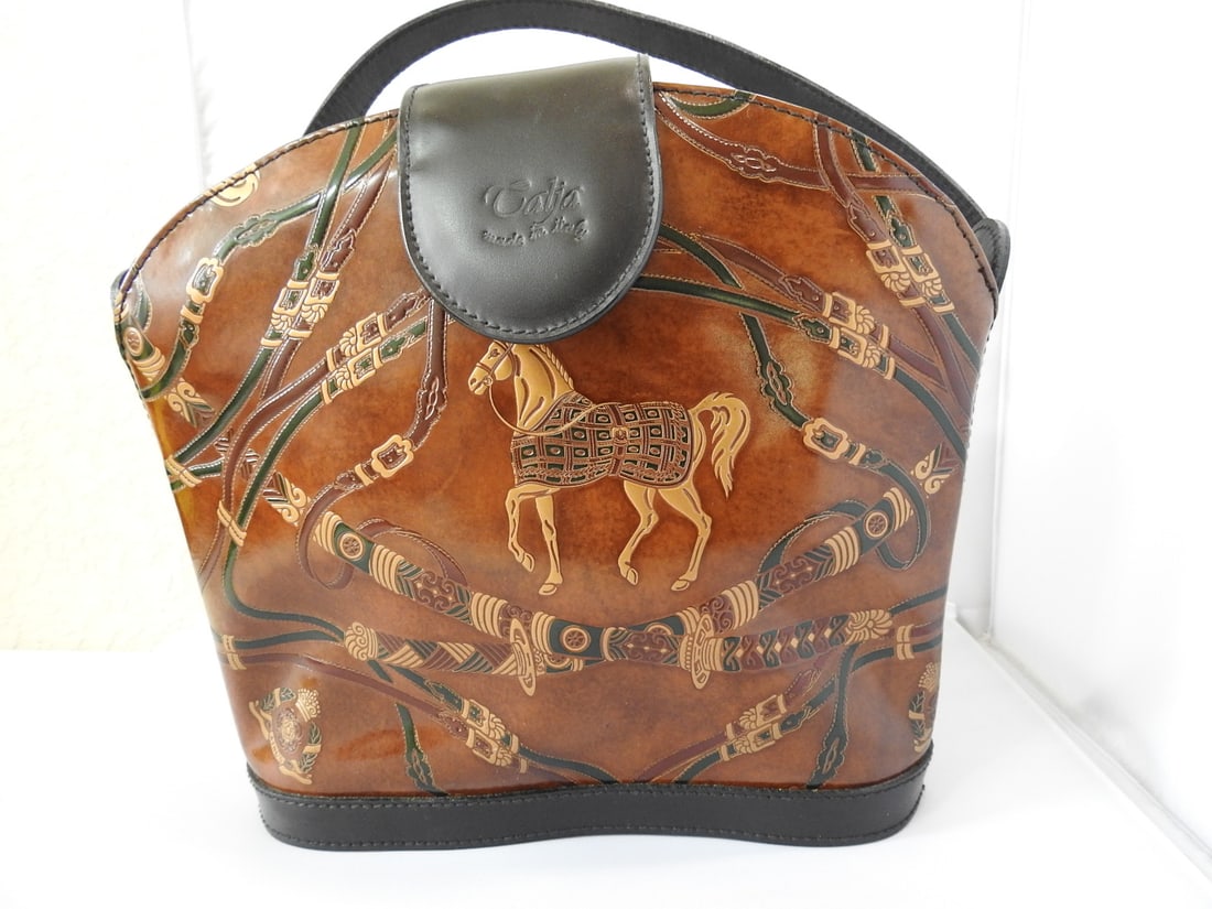 Made in Italy Genuine Leather Equestrian Style Bag: Equestrian style genuine leather bag made in Italy, new/unused per notes, with horse and saddle-themed decoration. Approx. 10 x 11 x 3.5 in.