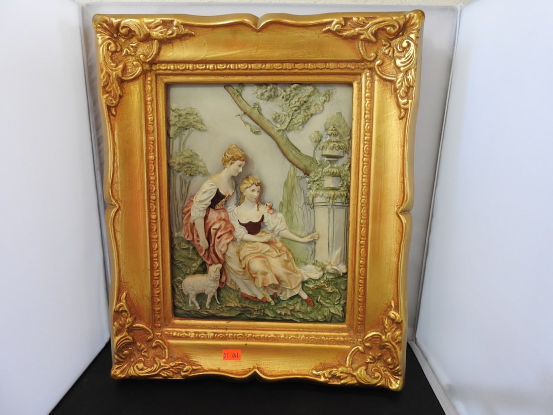 Andrea by Sadek Victorian Courtyard Porcelain Plaque in Gilt Frame: Andrea by Sadek hand-painted porcelain plaque depicting a Victorian courtyard scene, set in an ornate antiqued gold wooden frame. Approx. 3 x 15.75 x 12.5 in.