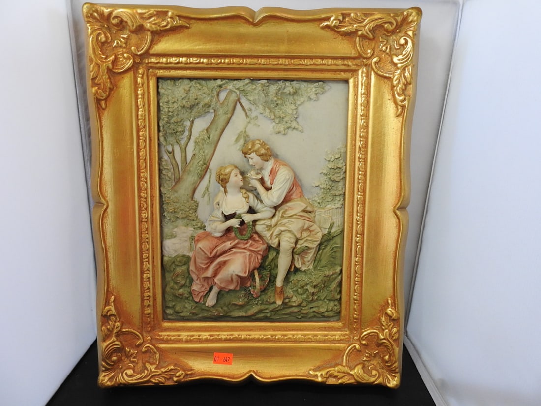 Andrea by Sadek Victorian Courtyard Porcelain Plaque in Gilt Frame: Andrea by Sadek hand-painted porcelain plaque depicting a Victorian courtyard scene, set in an ornate antiqued gold wooden frame. Approx. 3 x 15.75 x 12.5 in.