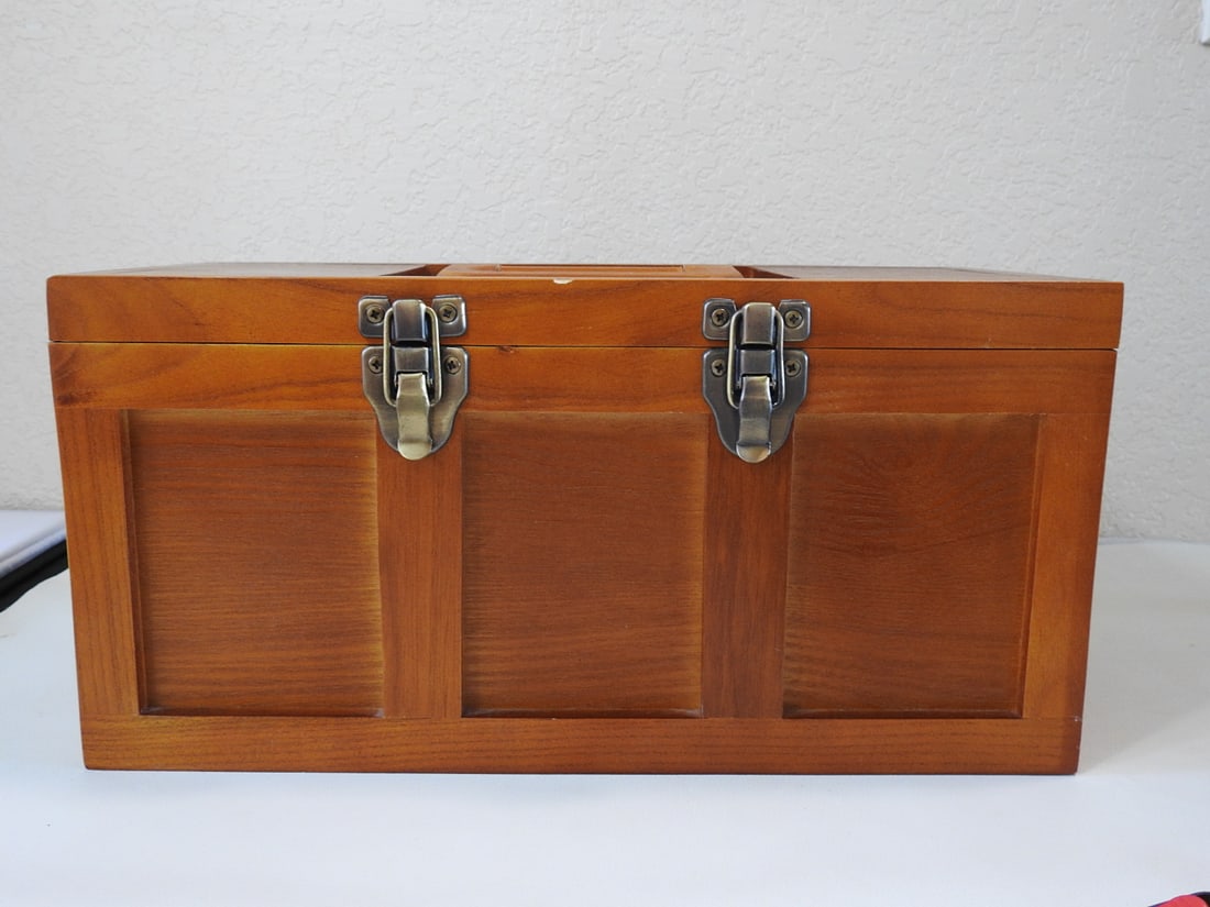 Wooden Storage Box with Metal Latches: Wooden storage box made in China with metal latches and hinged lid. Small dent on top noted. Approx. 8.25 x 16.25 x 7.75 in.
