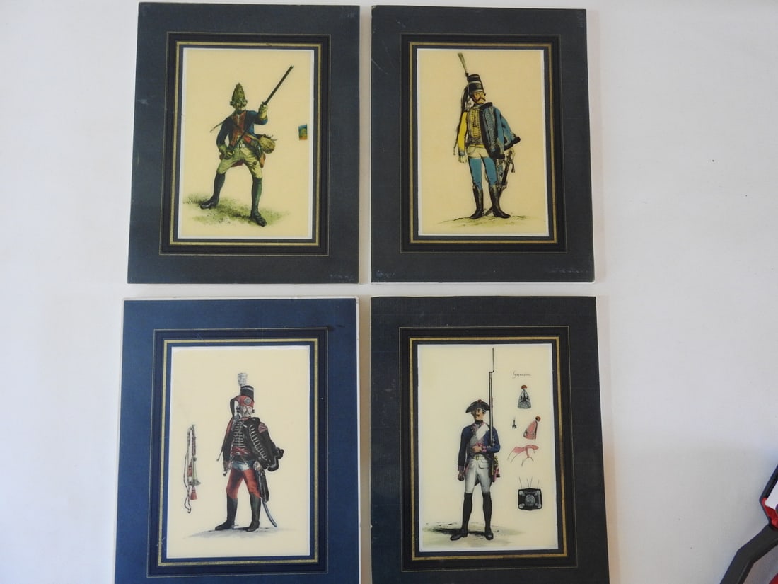 Set of Four Framed Plaque Prints: Set of four decorative plaque prints with ceramic and particle board style frames, featuring figural and equestrian subjects. Measured as a set. Approx. 2.5 x 12 x 9.25 in.