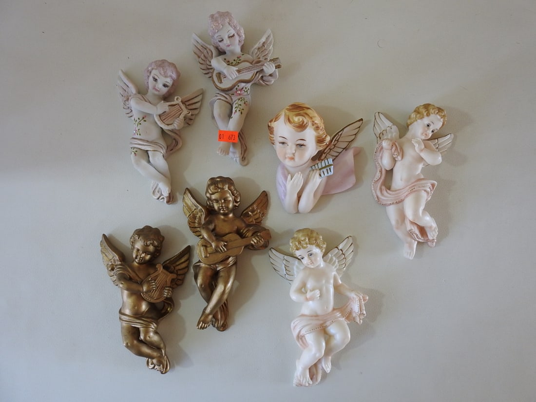 Set of Seven Vintage Porcelain Cherub Figures: Set of seven vintage porcelain cherub figures / wall decor pieces, Japanese import, in assorted white and gold-tone finishes. Measured as a set. Approx. 3 x 15 x 12 in.