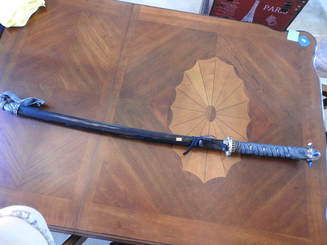Large Decorative Stainless Steel Sword with Resin Sheath: Large decorative sword with stainless steel blade and ornate blue-tone resin handle and sheath. Decorative display piece. Approx. 50 x 4.5 x 4.5 in.