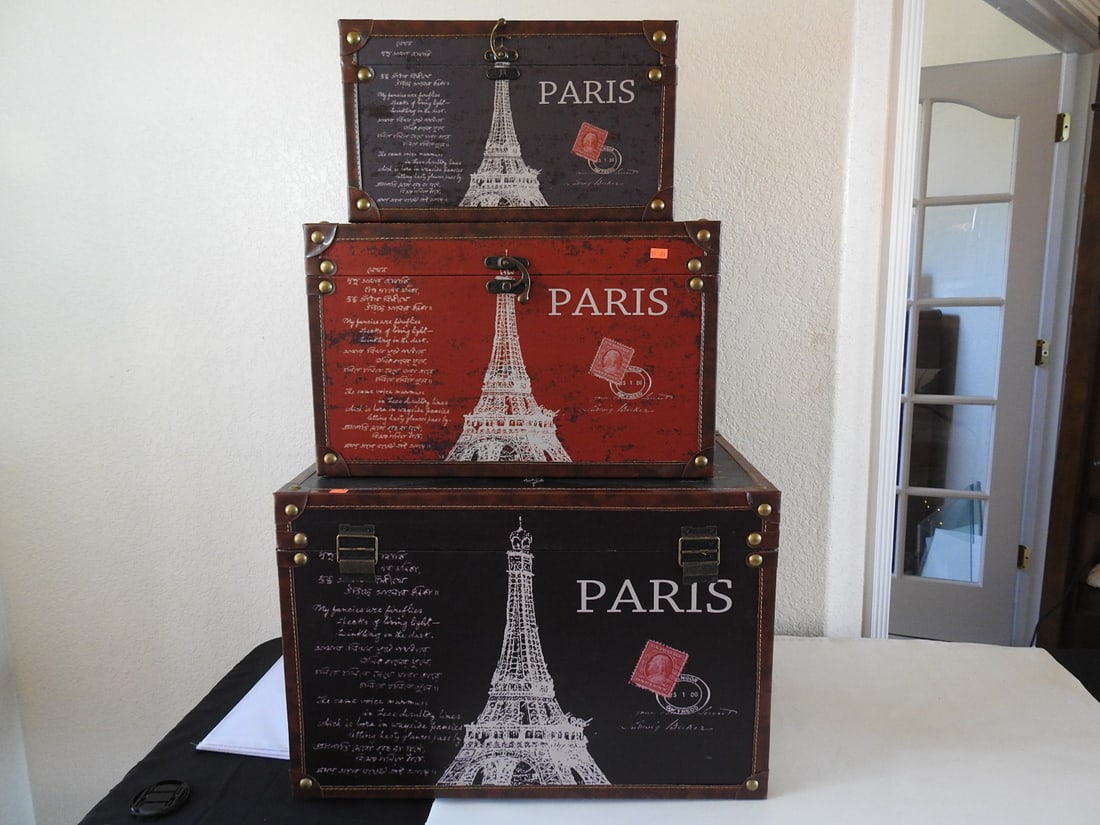 Studio Paris Decorative Nesting Boxes Set of 3: Studio Paris decorative nesting box set of three with Paris-themed printed exterior designs and fitted lids. Signs of wear noted. Approx. 17 x 24.5 x 16 in.