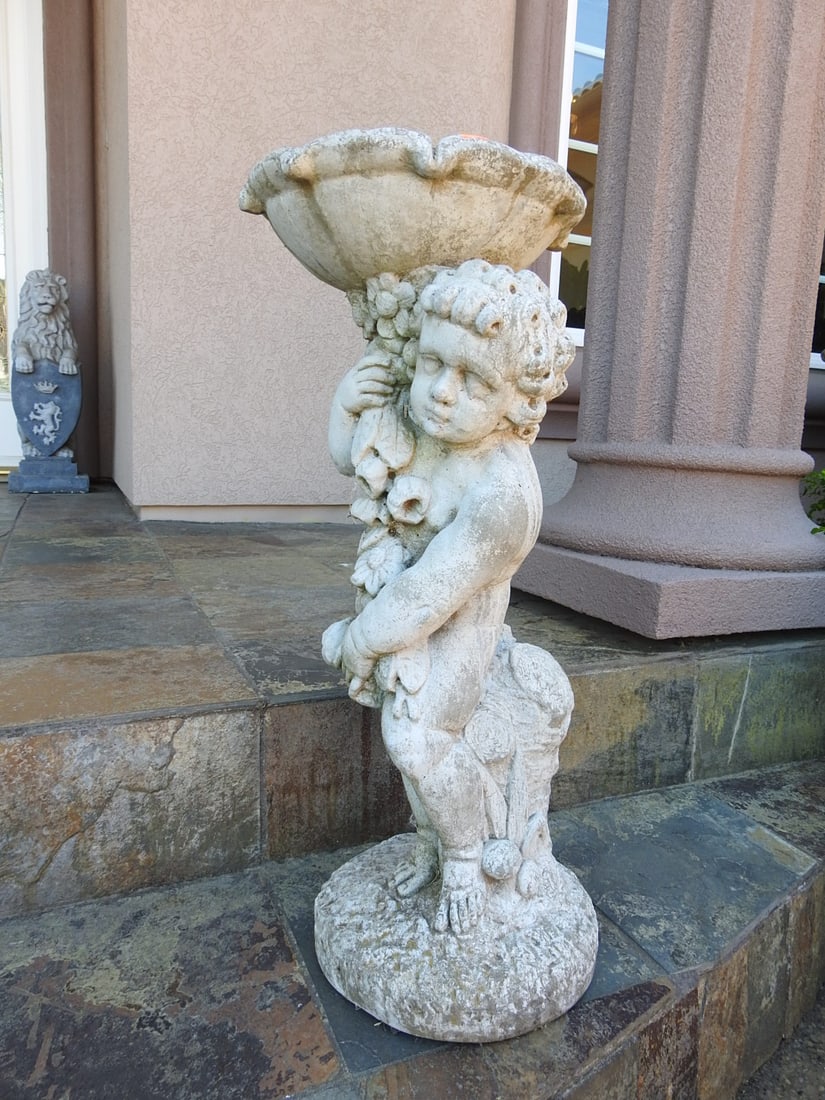 Classical Baroque Style Garden Birdbath / Planter: Classical Baroque style garden birdbath / planter with sculptural cherub and foliate decoration in aged stone-look finish. Approx. 28 x 11 x 12.5 in.
