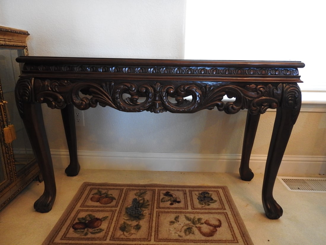Rococo Style Mahogany Console Table with Marble Top: Rococo style mahogany console table with carved apron, cabriole-style legs, and Breccia Pernice marble top. Approx. 29 x 45.25 x 16.25 in.