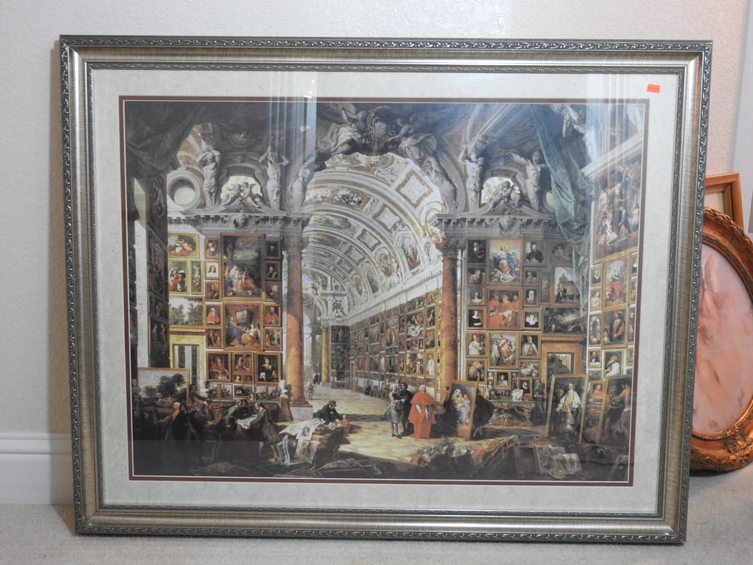 Giovanni Panini Gallery Interior Framed Reprint: Framed reprint after Giovanni Panini depicting a grand gallery / architectural interior scene. Approx. 32 x 29.5 x 2 in.