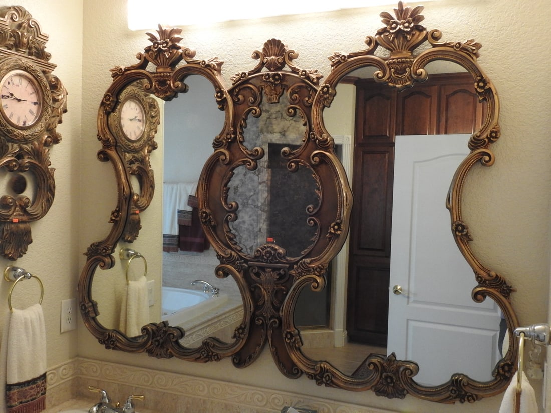 Large French Rococo / Baroque Gilt Wall Mirror: Large French Rococo / Baroque style wall mirror with gold and silver gilt frame, ornate cresting, and marbled/pebbled mirror panels. Approx. 48 x 62.5 x 3 in.