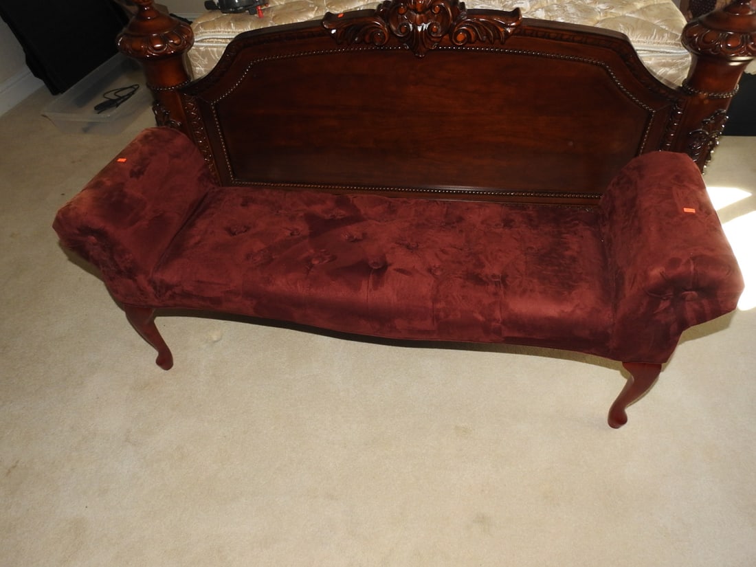 Rococo Style Burgundy Tufted Settee Bench: Rococo style settee bench with burgundy faux suede / velvet-look tufted upholstery, rolled arms, carved-style frame, and cabriole legs. Approx. 24 x 60 x 17 in.