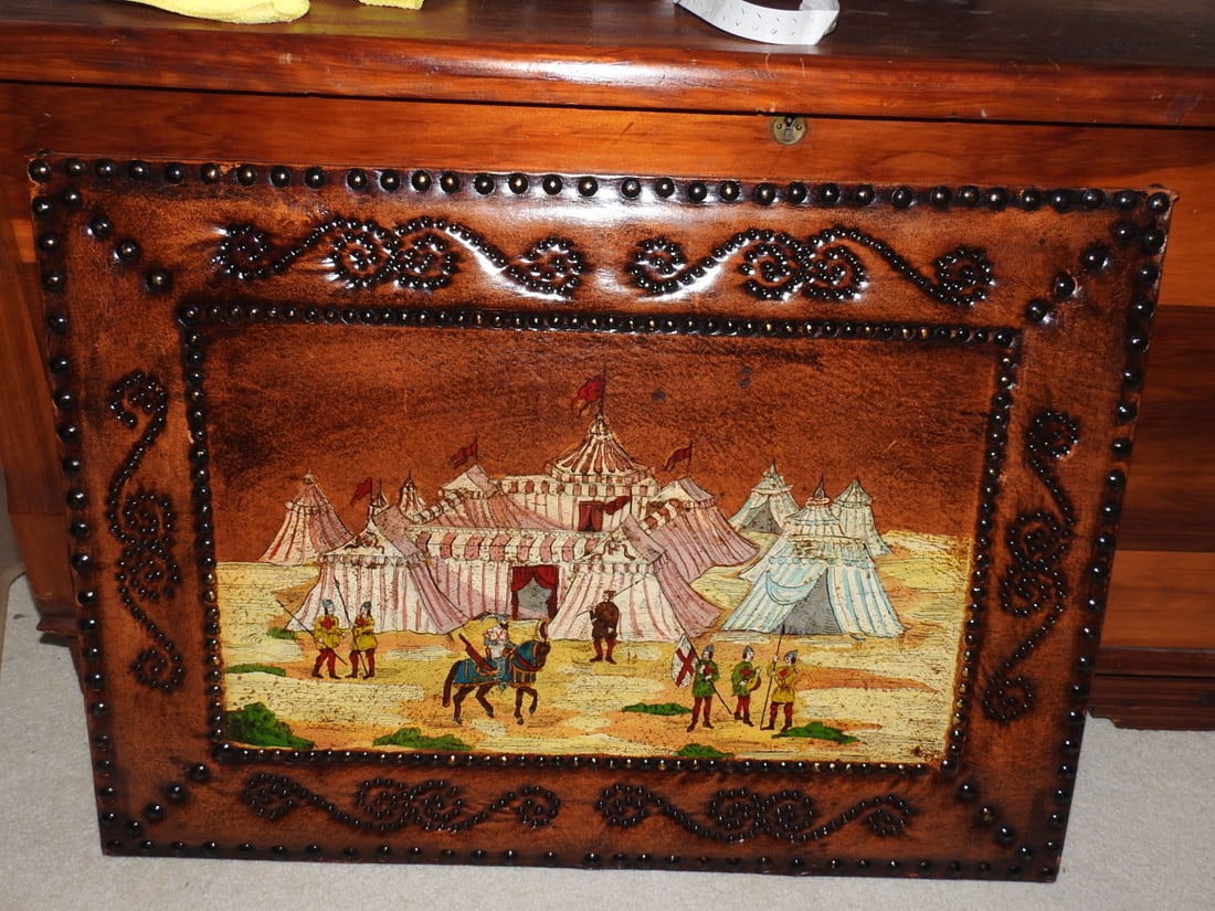 Painted Spanish Leather Wall Art Panel: Decorative wall art panel painted on leather, made in Spain, with brass stud accents and carved/embossed leather border. Approx. 20 x 28 x 1 in.