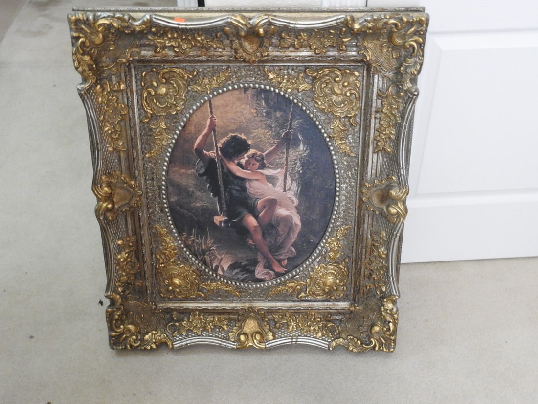 Springtime After Pierre-Auguste Cot Framed Reprint: Decorative framed reprint after Pierre-Auguste Cot’s Springtime, housed in a solid wood frame with gold and silver gilt finish. Approx. 32.5 x 28.5 x 3.5 in.