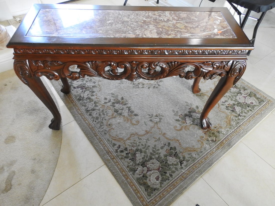 Rococo Style Marble Top Console Table: Vintage Rococo style console table with Breccia Pernice marble top, carved mahogany wood frame, cabriole legs, and ornate carved detail. Approx. 29 x 45.25 x 16.25 in.