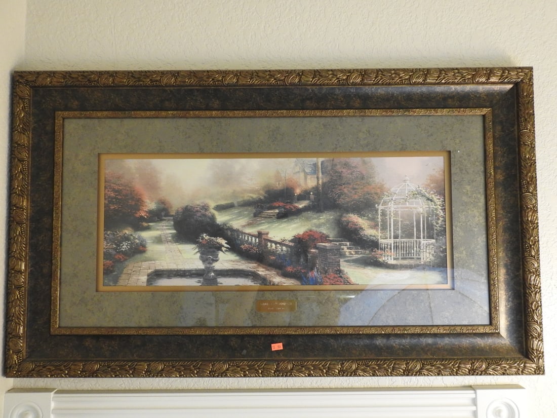 Thomas Kinkade Gardens Beyond Autumn Gate Print: Thomas Kinkade print titled Gardens Beyond Autumn Gate, presented in a decorative frame. Approx. 24 x 39 x 2.5 in.