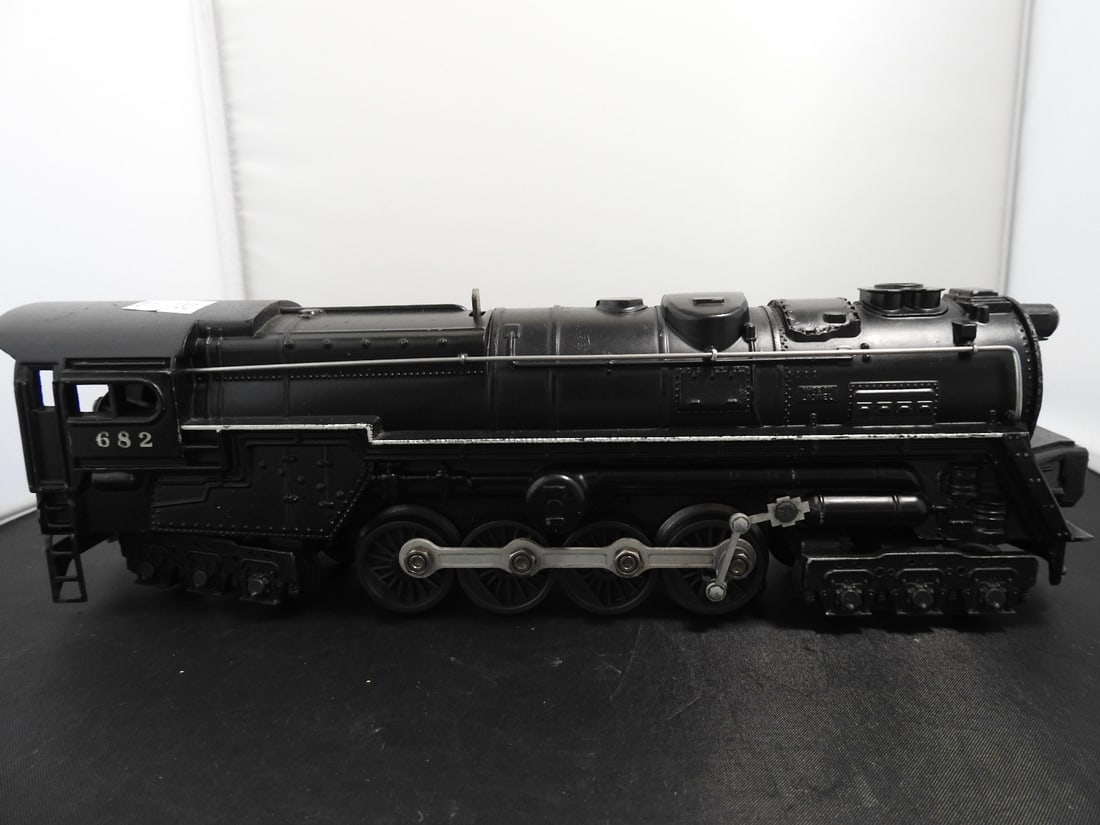 Lionel No. 682 Steam Turbine Locomotive: Lionel O gauge No. 682 black steam turbine locomotive with cab number 682, die-cast body, running gear, and front pilot assembly. Postwar-era, 1950s Lionel production; operation not fully tested