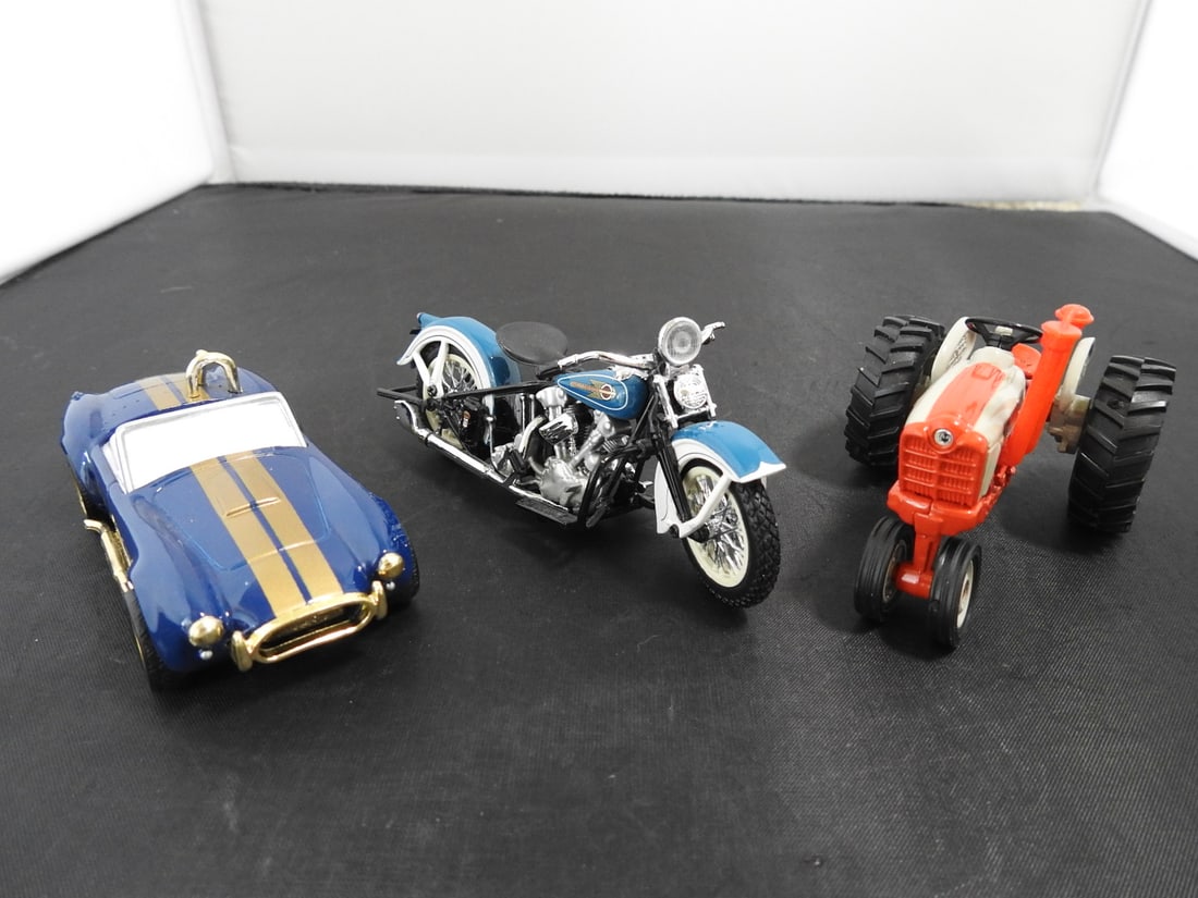 Lot of Die-Cast Toy Cars: Mixed lot of die-cast toy cars. Late 20th century collectible vehicle lot, measured as packed. Approx. 2.25 x 4.25 x 4.5 in.