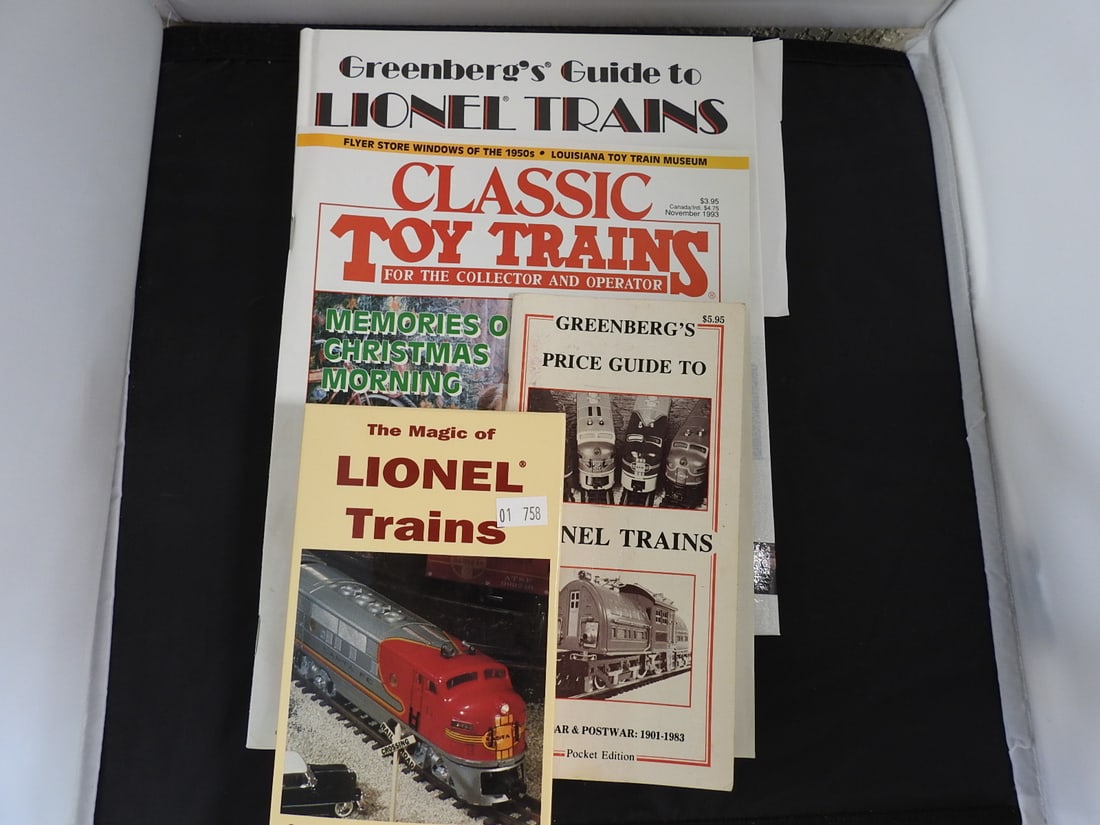 Lionel Train Reference Books and VHS Lot: Lot of Lionel and model railroading reference materials, including Lionel train books/catalogs and a Classic Toy Trains VHS tape. Mostly late 20th century reference material, measured as packed. Appro