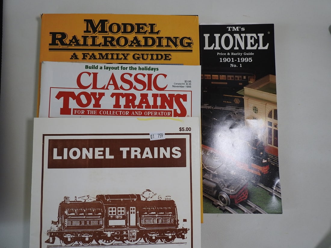 Lionel and Model Railroading Reference Book Lot: Lot of Lionel and model railroading reference books, including Classic Toy Trains and Lionel train guides. Mostly late 20th century reference material, measured as packed. Approx. 2 x 11.25 x 9 in.